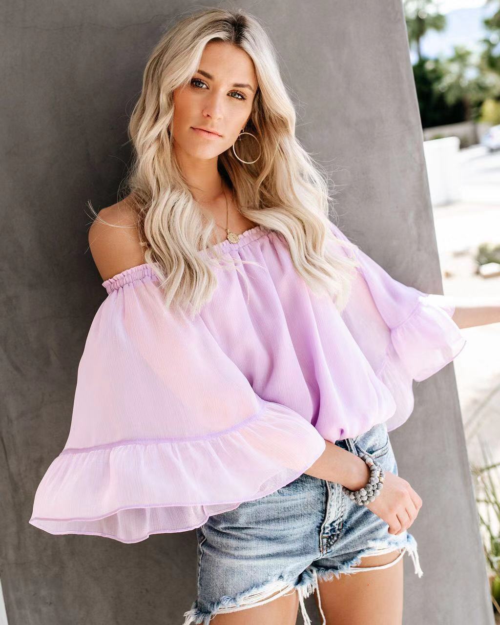 Damebluse med vide ermer og av-shoulder design Skjora