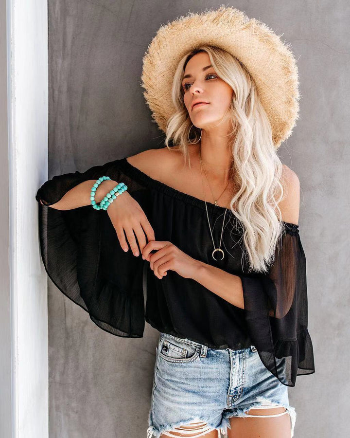Damebluse med vide ermer og av-shoulder design Skjora