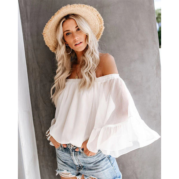 Damebluse med vide ermer og av-shoulder design Skjora