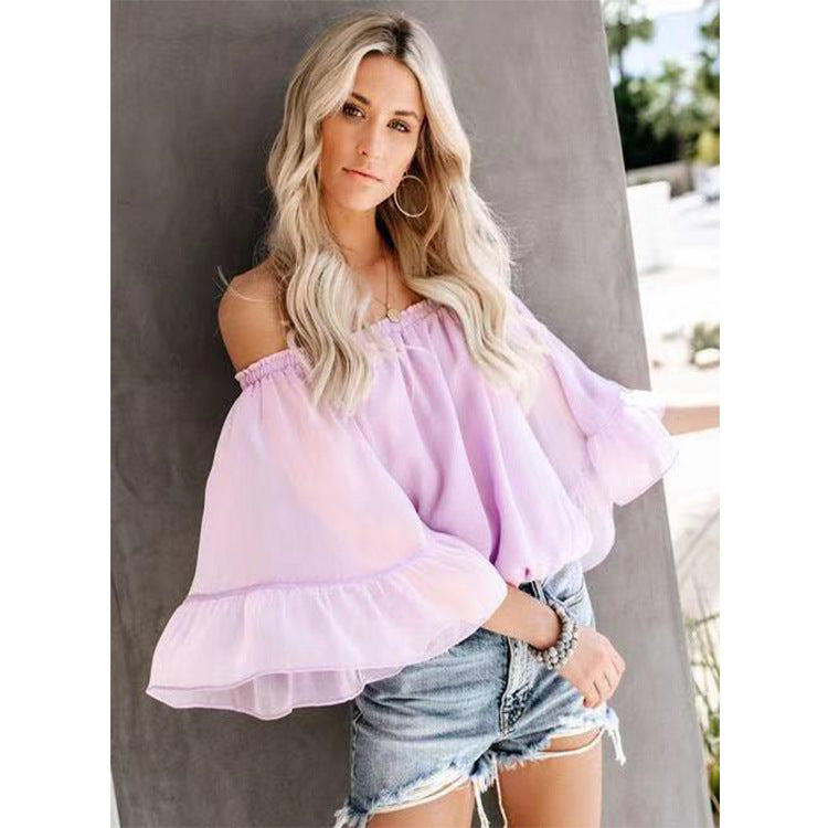 Damebluse med vide ermer og av-shoulder design Skjora