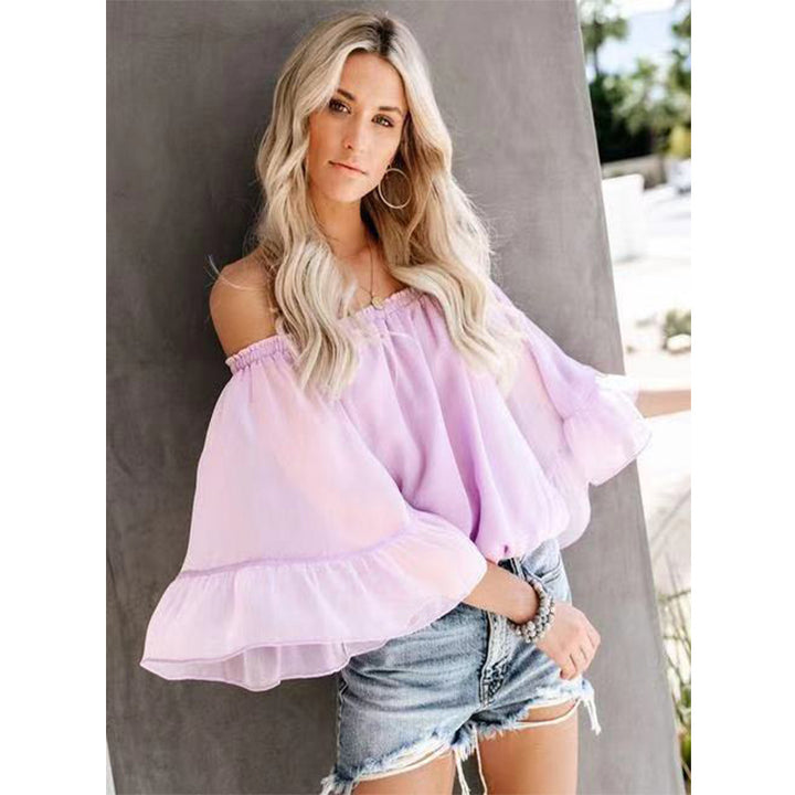 Damebluse med vide ermer og av-shoulder design Skjora