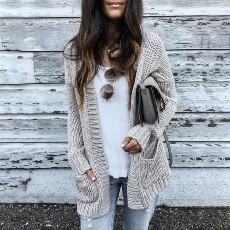 Kvinnes chunky strikk cardigan med praktiske lommer og åpen front Skjora