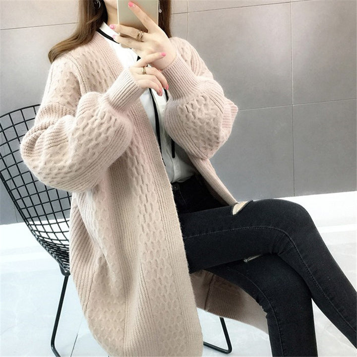 Kvinnens chunky strikket cardigan med åpen skjæring og dyp V-hals Skjora