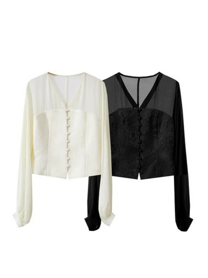 Two blouses side by side in cream and black colour options