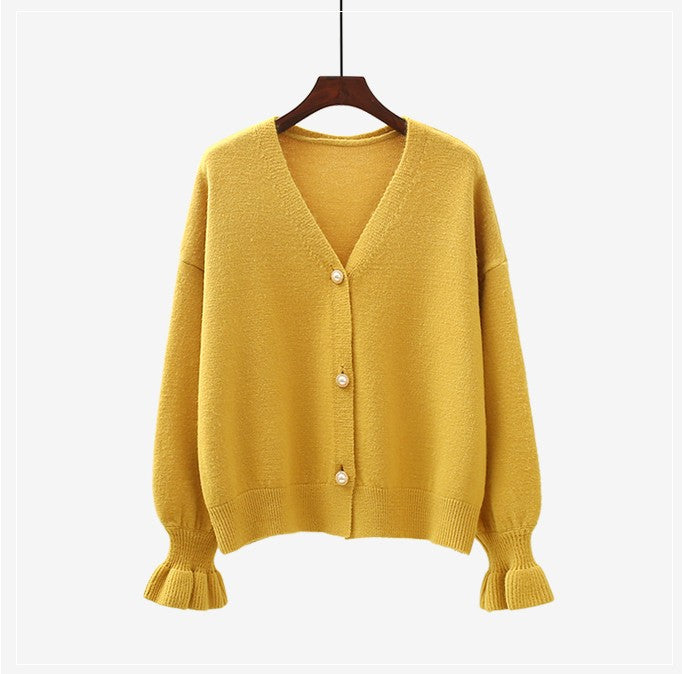 Dame cardigan med perleknapper og løs passform Skjora