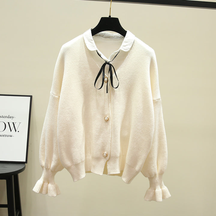 Dame cardigan med perleknapper og løs passform Skjora