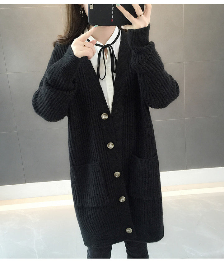 Dame cardigan med lappelommer og knappestolpe Skjora