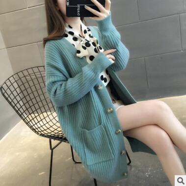 Dame cardigan med lappelommer og knappestolpe Skjora