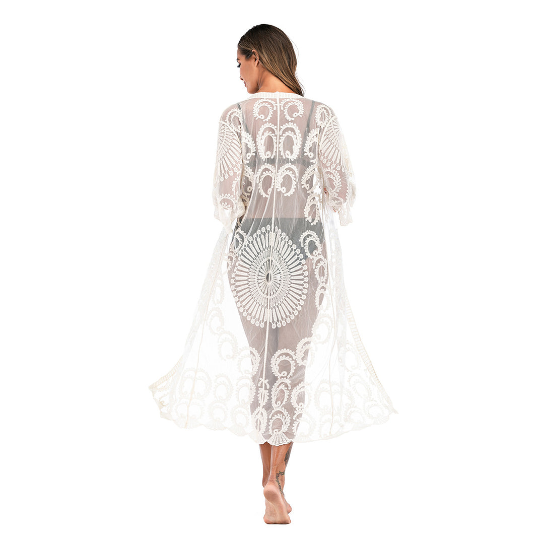 Dame heklet strandkåpe med elegant blomsterdesign og uformell snitt Skjora