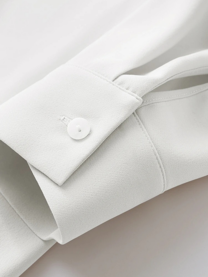 Asymmetrisk chiffongbluse med jakkekrage