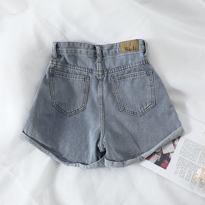 Damens høytlivs denimshorts med omslagskant og elastisk liv Skjora