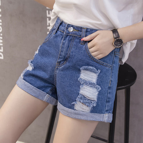 Kvinnenes denimshorts med trendy slitt design og uformell oppbrett