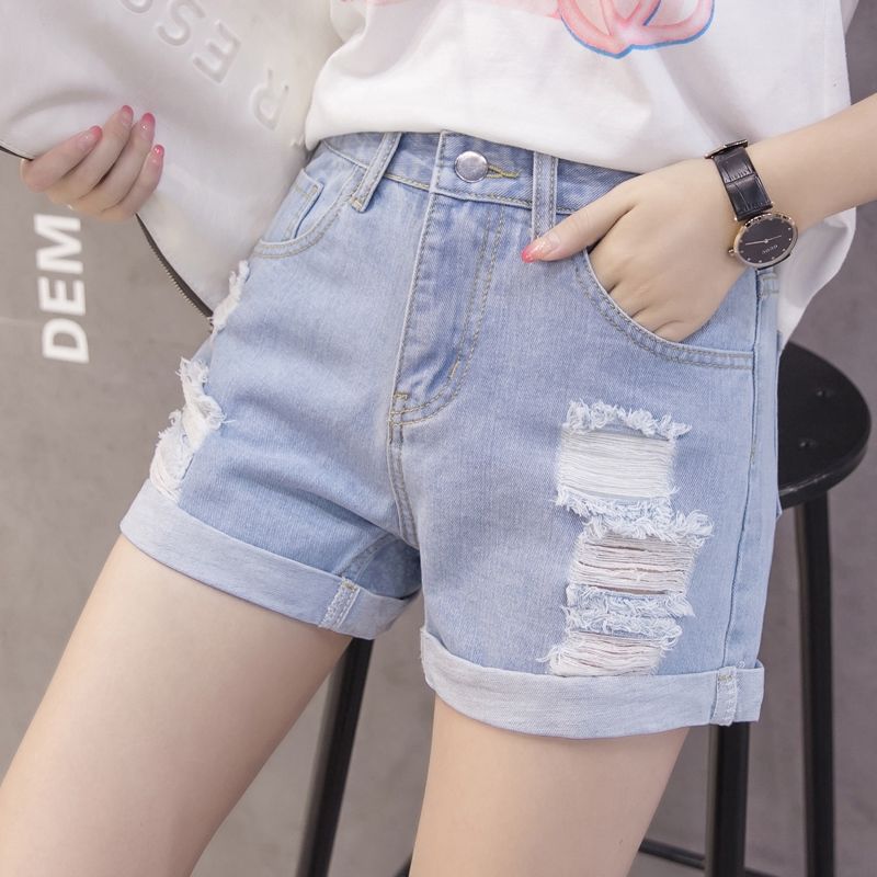 Kvinnenes denimshorts med trendy slitt design og uformell oppbrett