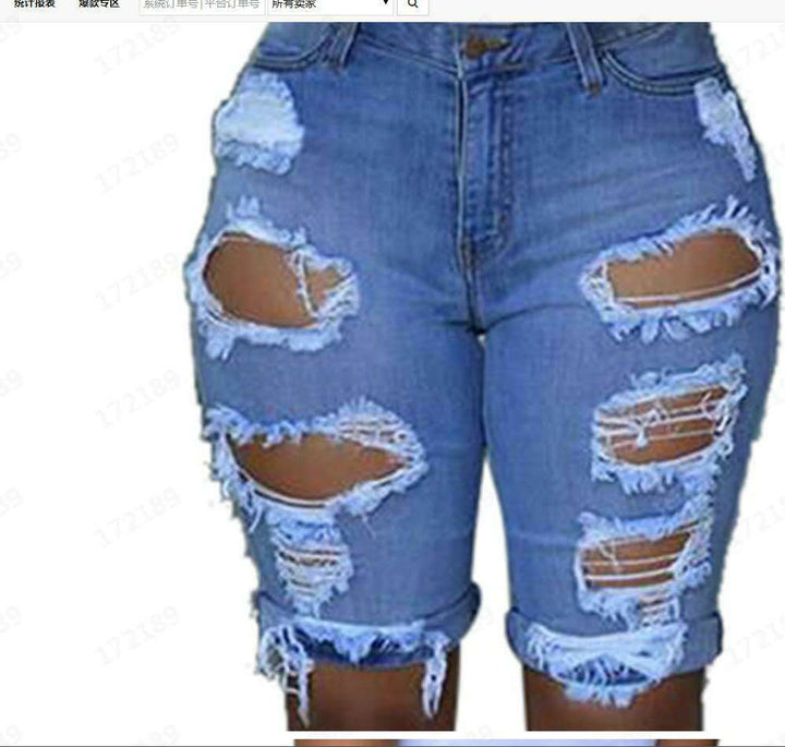 Damene Destroyed Denim-bukser med avslappet passform og stilige rippe-detaljer Skjora