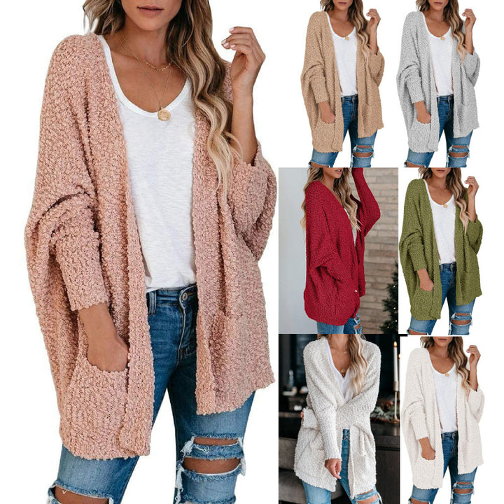 Kvinnekomfortabel cardigan med åpen skjæring og store lommer Skjora