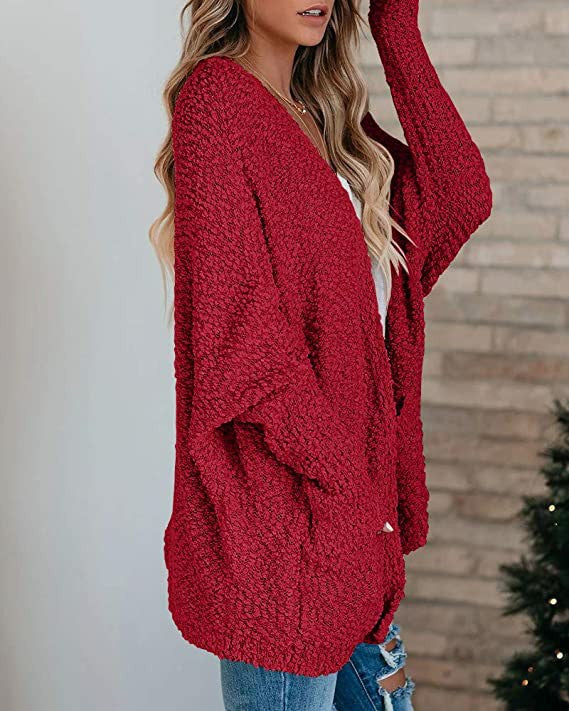 Kvinnekomfortabel cardigan med åpen skjæring og store lommer Skjora