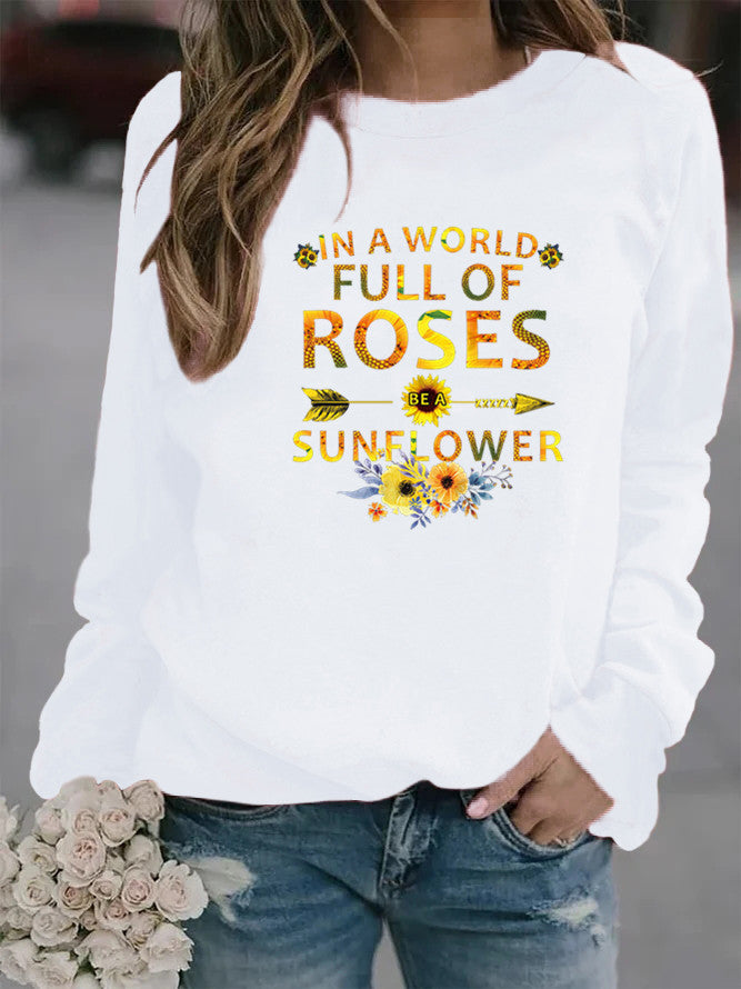 Dame sweatshirt med inspirerende design og blomsterdekorasjon Skjora