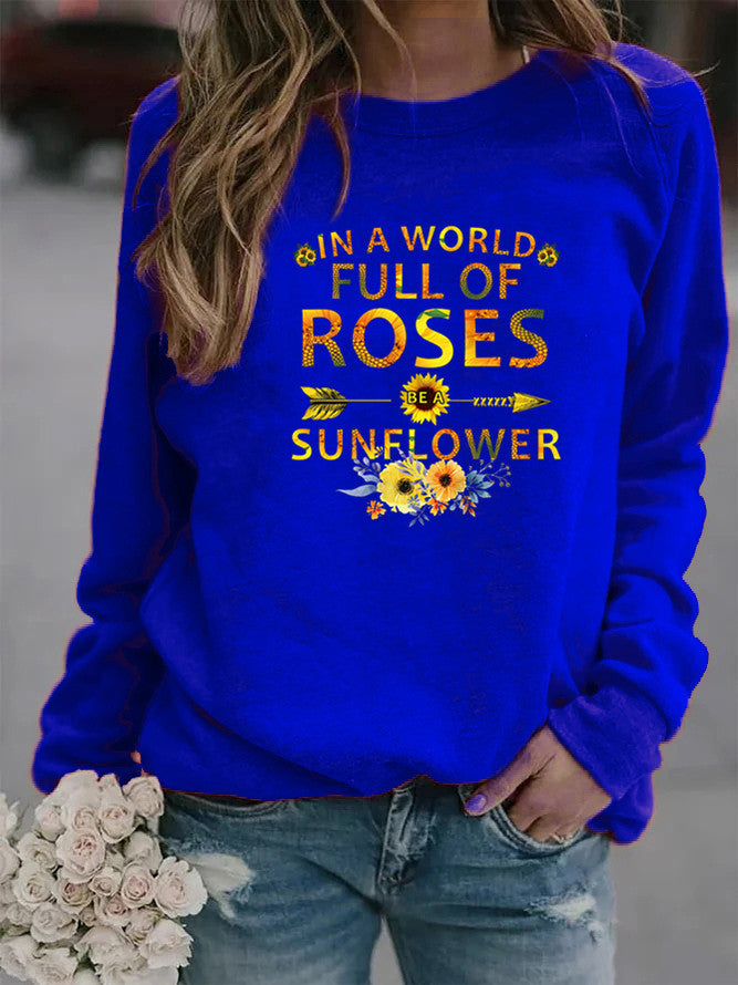 Dame sweatshirt med inspirerende design og blomsterdekorasjon Skjora