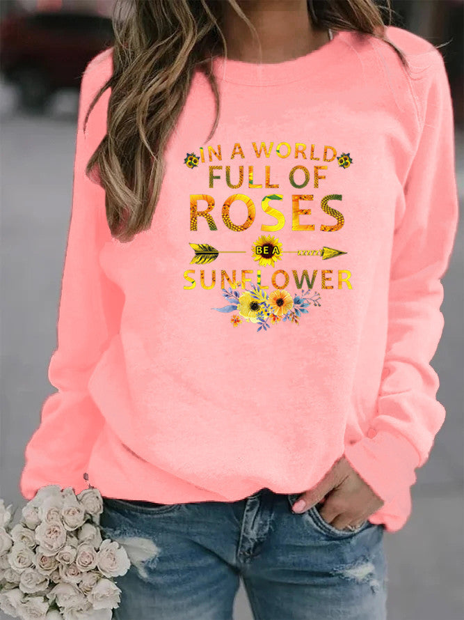 Dame sweatshirt med inspirerende design og blomsterdekorasjon Skjora