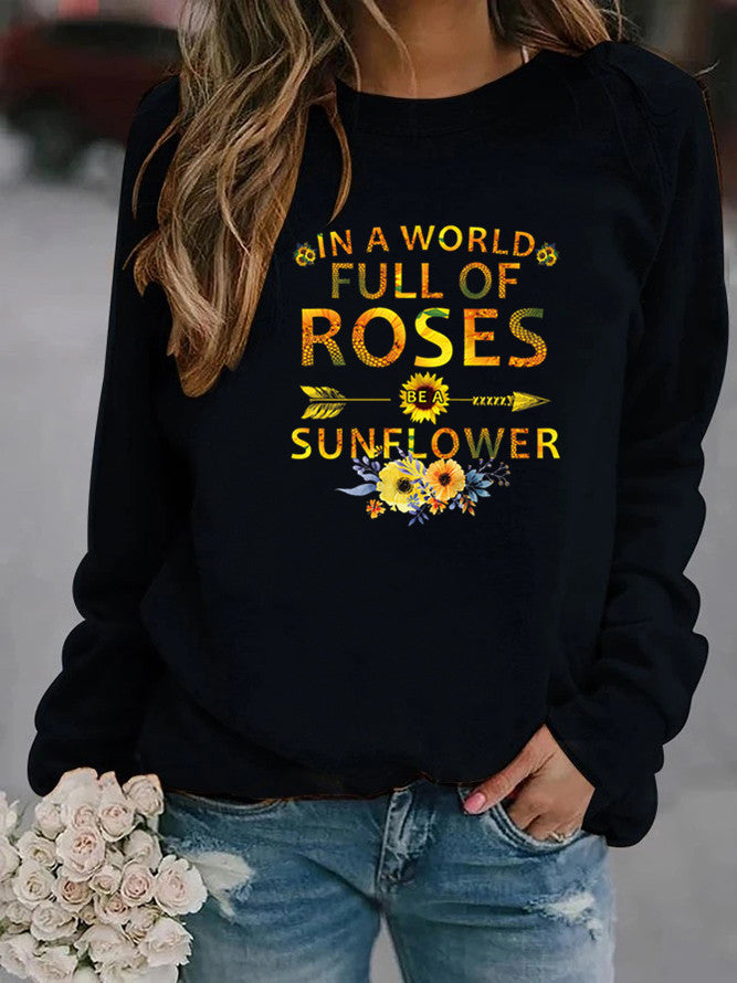 Dame sweatshirt med inspirerende design og blomsterdekorasjon Skjora