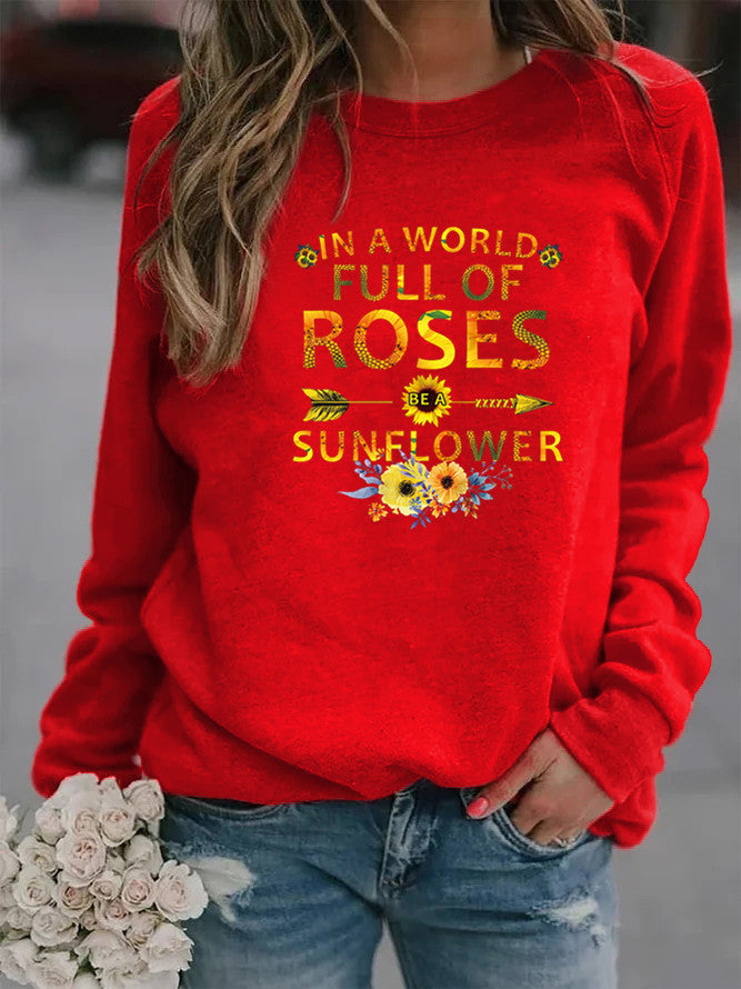 Dame sweatshirt med inspirerende design og blomsterdekorasjon Skjora