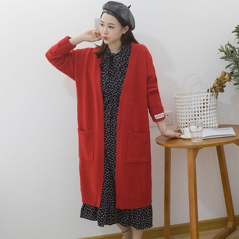 Kvinnes oversized cardigan med lommer Skjora