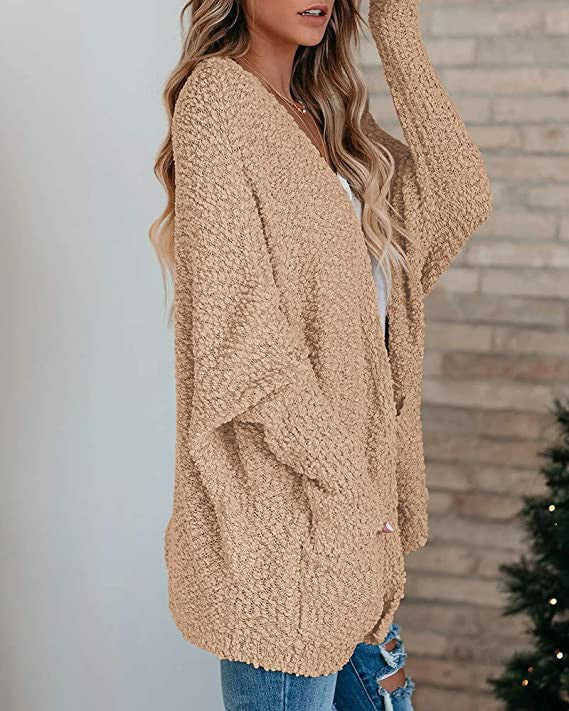 Kvinnekomfortabel cardigan med åpen skjæring og store lommer Skjora