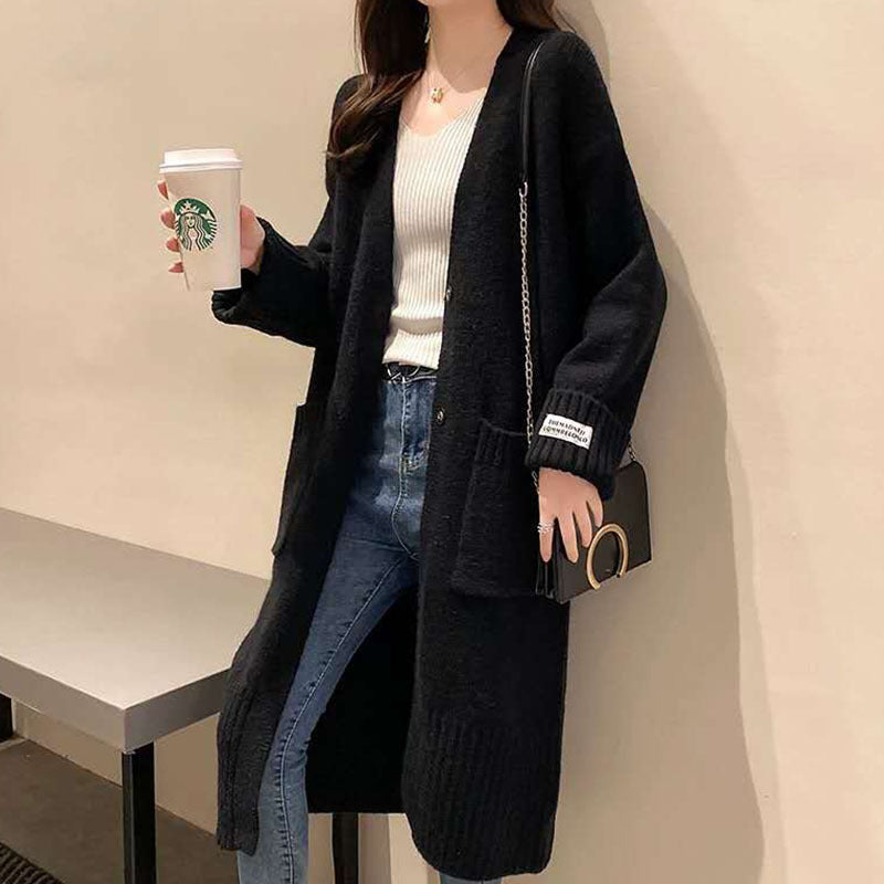 Kvinnes oversized cardigan med lommer Skjora