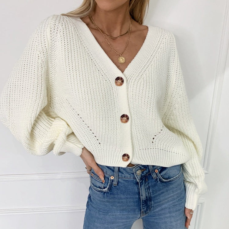 Kvinnens trendy chunky strikkegenser med knappeløsninger og løs passform Skjora