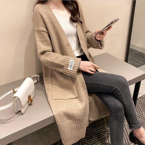 Kvinnes oversized cardigan med lommer Skjora