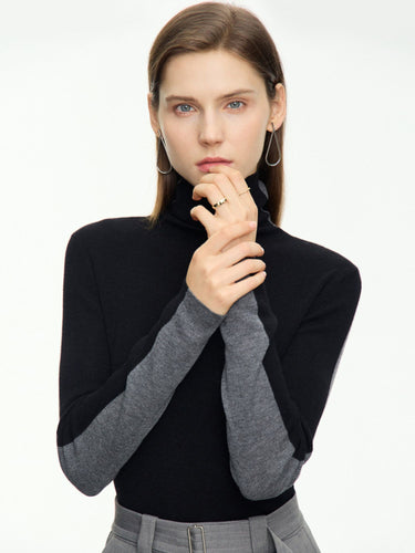 Stilig tofarget turtleneck-genser i grå og svart tofarget design