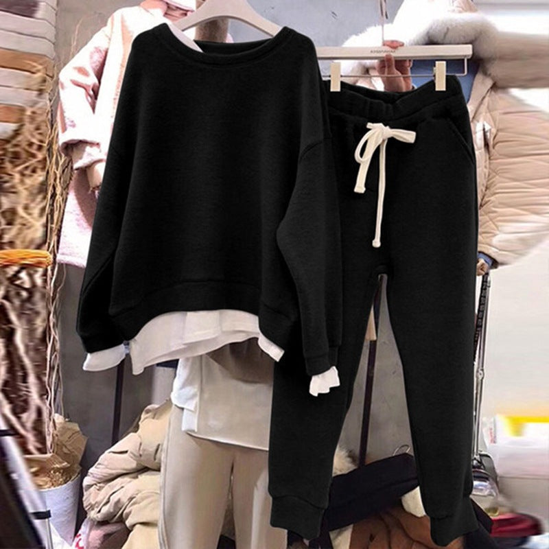 Kvinnes avslappet fritids sportsett med oversized genser og avslappede joggebukser Skjora