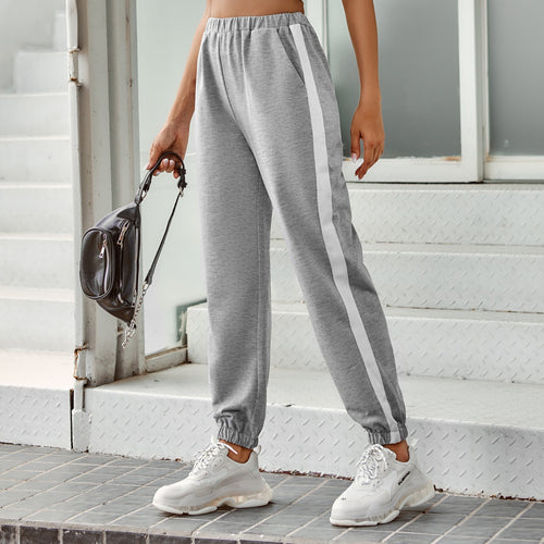 Dames komfortable joggebukser med sidestriper og elastisk liv Skjora