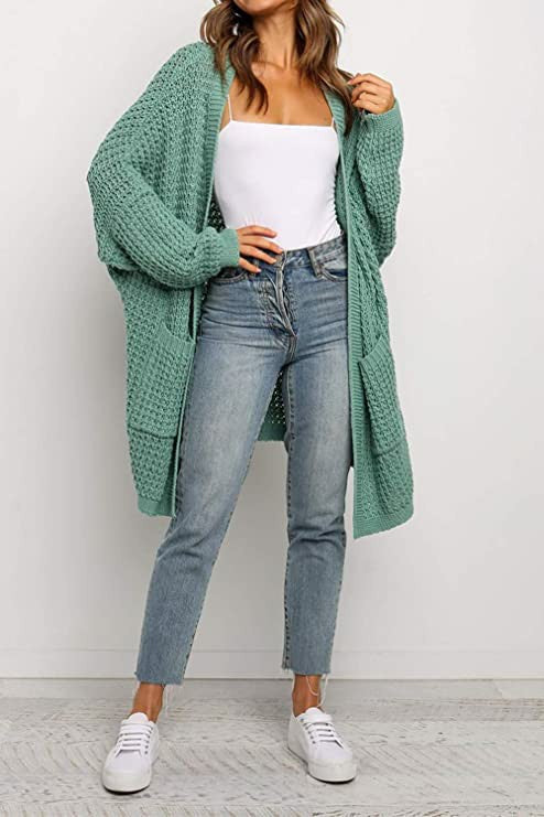 Dame chunky strikket cardigan med praktiske lommer og løs passform Skjora