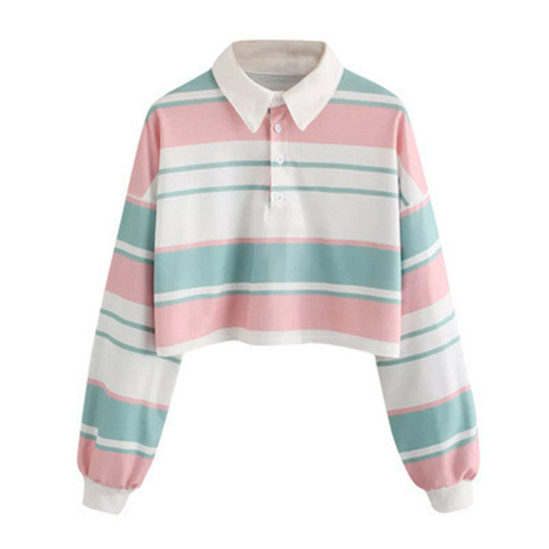 Dame polo skjorte i en avslappet crop design med et stilfullt fargeblokk mønster Skjora