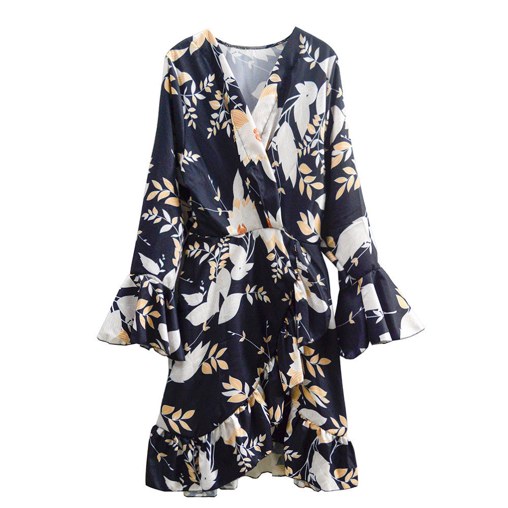 Women's wrap dress with floral print and ruffle details Skjora