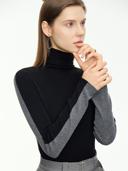 Stilig tofarget turtleneck-genser i grå og svart tofarget design