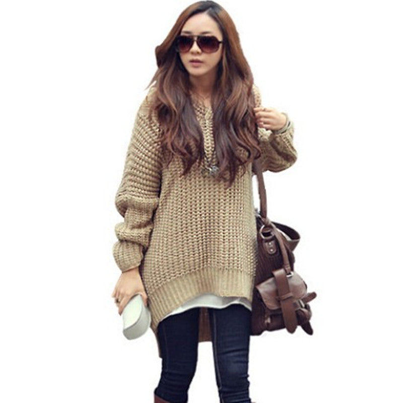 Kvinnens chunky strikket poncho med frynser og hette Skjora