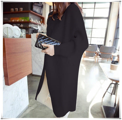 Dame avslappet lang cardigan med åpen front og fint strikkemønster Skjora