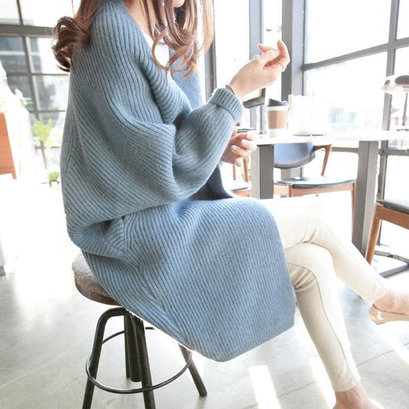 Dame avslappet lang cardigan med åpen front og fint strikkemønster Skjora