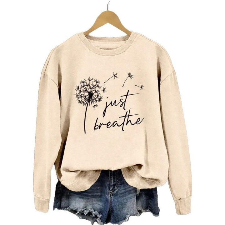 Dame sweatshirt med inspirerende løvetannmotiv Skjora