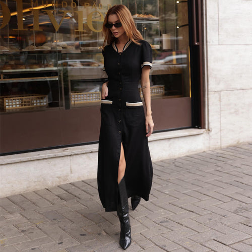 Kvinne maxi kjole med elegant knappestolpe og sideslitt