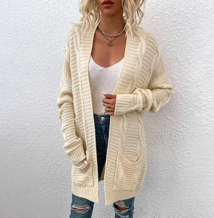 Kvinne chunky strikk cardigan med lommer og åpen frontdesign Skjora