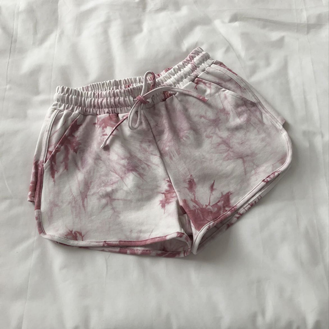 Kvinne casual sweatshorts med trendy tie-dye design og praktiske sidelommer