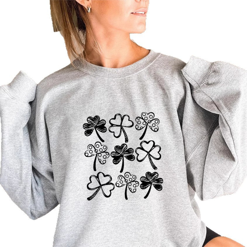 Kvinnes sweatshirt med leken kløvermotiv Skjora