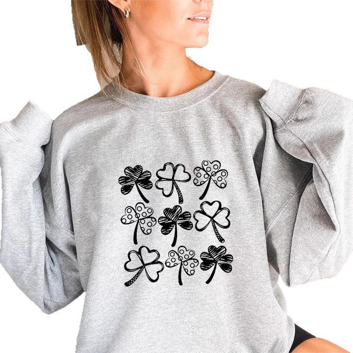 Kvinnes sweatshirt med leken kløvermotiv Skjora