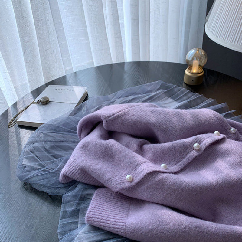 Dame cardigan med elegante perleknapper og moderne design Skjora
