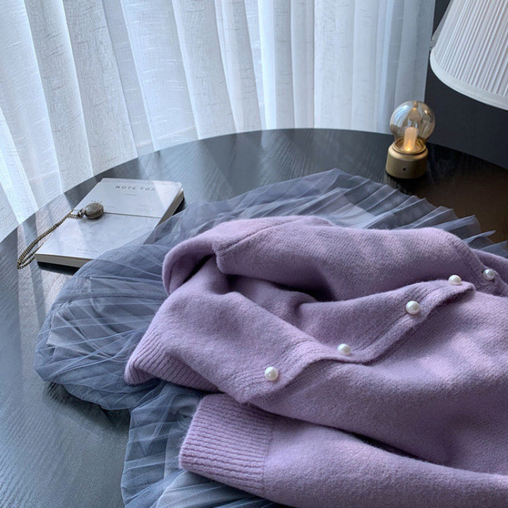 Dame cardigan med elegante perleknapper og moderne design Skjora