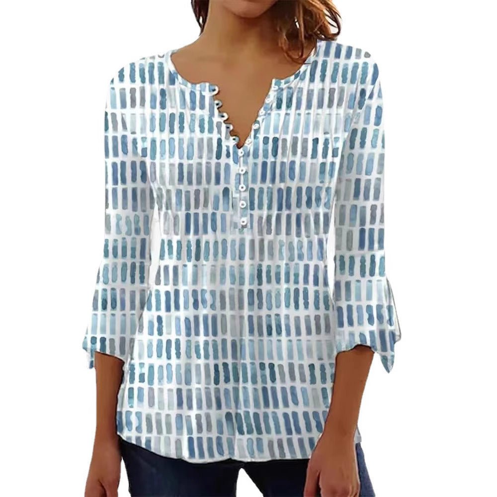 Damebluse i moderne grafisk design med knappe detaljer Skjora