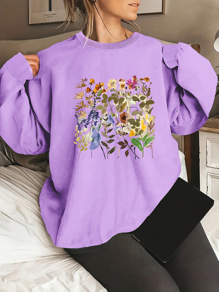 Dame sweatshirt med blomsterdesign og komfortabel passform Skjora